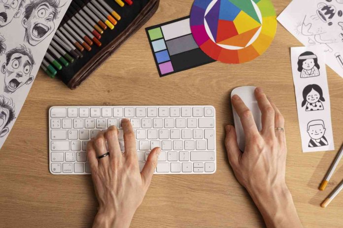 A man using a pc and typing keyboard and clicking mouse in a table